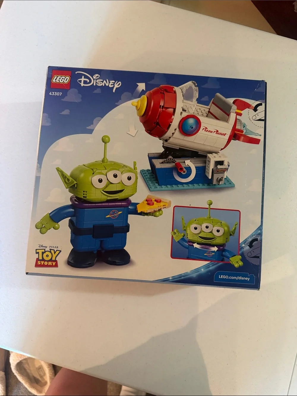 LEGO Disney Pixar Alien in Red & White Pizza Planet Rocket